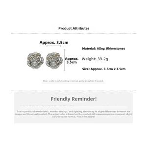 Detailed view of silver flower earrings with rhinestones, 3.5cm size and silver pins