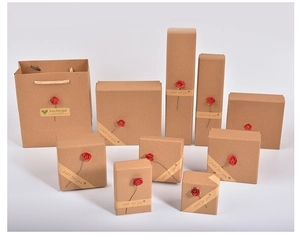 Brown kraft paper jewelry gift boxes with red roses and Just for you decorative ribbons