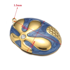 Detailed view of blue enamel floral pendant with crystal inlay and 31mm x 24mm dimensions