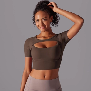 Close-up of brown mesh patchwork sports top with stylish hollow-out front neckline detail