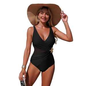 Black one-piece swimsuit with mesh panels, V-neck, and starfish detail on white background