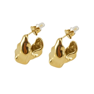 Irregular sculptural gold plated stainless steel hoop earrings for women on white background