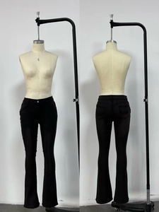 Front and back detail views of low-waist black flare jeans on a size 6 mannequin