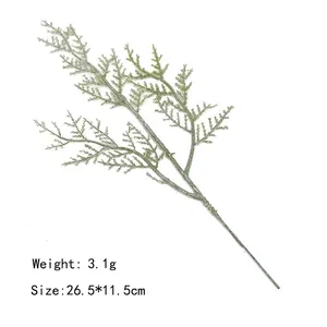 Detailed view of artificial green pine branch measuring 26.5x11.5cm for holiday decor