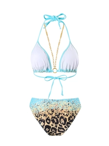 Detail of white triangle bikini top with gold chain halter and leopard print bottoms