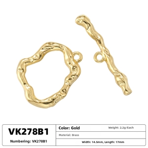 Detail of 18K gold plated brass OT toggle clasp with organic melted texture for jewelry