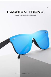 Blue polarized fashion sunglasses with reflective lenses displayed on geometric props