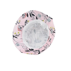 Internal view of floral bucket hat showing white lining and fabric care label details
