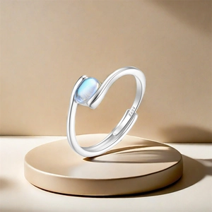Macro shot of S925 sterling silver adjustable ring with blue oval moonstone gem