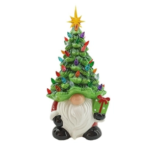 Ceramic Christmas gnome figurine with LED lit tree hat and gift box on white background