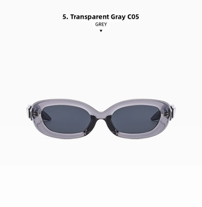 Detail view of oval sunglasses in transparent grey C05 finish with dark lenses