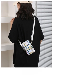 Detailed back view of a colorful checkerboard oxford fabric crossbody mobile phone bag