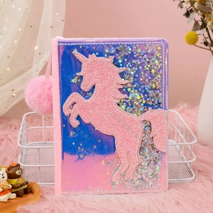 Detail of unicorn notebook with liquid glitter sequins and soft pink plush edges