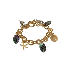 Golden ocean theme bracelet with starfish, seashell, and colorful charms on white background