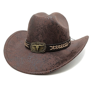 Brown western cowboy hat with snake texture and vintage bull skull buckle detail