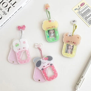 Detail of cute acrylic animal photo frame keychains with colorful bead chains
