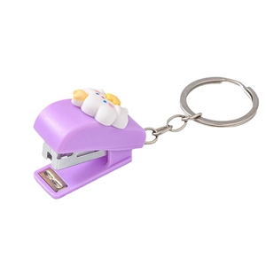 Mini purple stapler with cute cloud charm and metal keychain on a clean white background