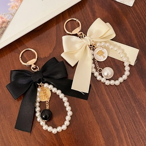 Elegant Satin Bow Keychain With Faux Artificial Pearl Ring And Golden Alloy Embossed Pendant For Women Bag Accessories