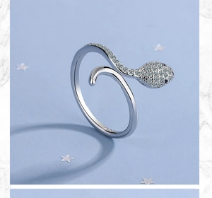 Detailed close-up of S925 sterling silver stamp on an adjustable snake ring with crystals