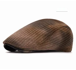 Detail shot of the coffee brown knitted vertical stripes texture on a warm flat cap