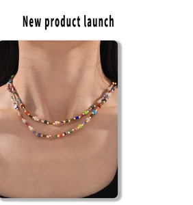 Detail of colorful stone square beads with metal spacers on a double-layer necklace