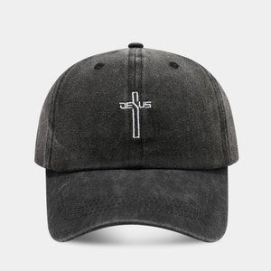 Close-up of Jesus cross embroidery on washed cotton vintage baseball cap