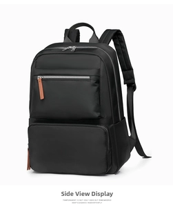 Side view of black casual backpack featuring durable nylon fabric and silver metal zippers