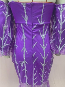 Detail of silver sequin vine pattern and back zipper on purple mermaid evening dress