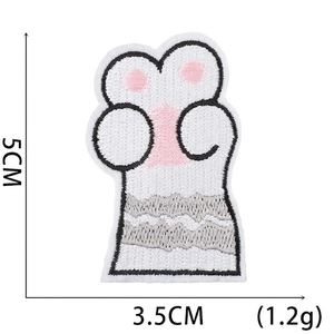 Detailed close-up of a cat paw embroidery patch with dimensions 5cm by 3.5cm