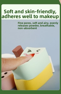 Macro shot of a finger pressing a soft macaron-colored makeup sponge for rebound test