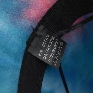 Detail of fedora hat interior showing the 65% cotton fabric label and sweatband