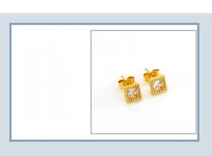 Detail view of square zircon stud earrings with 7mm dimensions and 18k gold plating