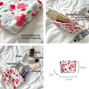 Vintage floral makeup bag with metal zipper and spacious wide bottom design