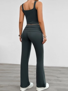 Rear view of deep gray sleeveless square neck top and high-waisted flared pants set