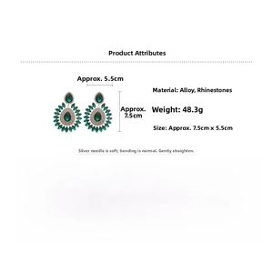 Detail view of large green crystal flower earrings with 7.5cm x 5.5cm size specifications