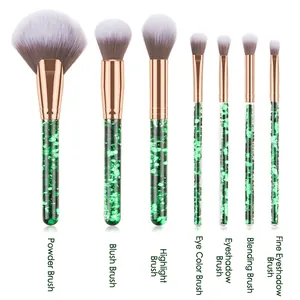 7-piece professional makeup brush set with green glitter handles and synthetic gradient bristles