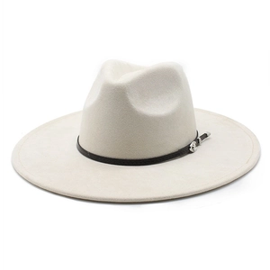 Detailed view of off-white wide brim felt hat with black leather band and silver buckle