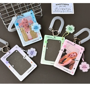 Detail view of colorful acrylic photocard holders in blue, pink, purple, and green colors