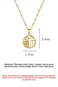 Macro view of gold-plated lucky coin pendant with micro-inlaid stones on titanium steel chain