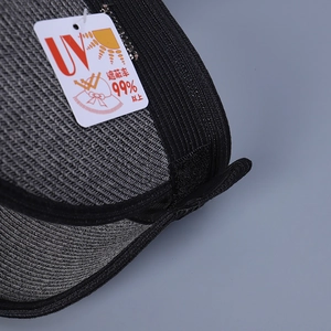 Detail of UV protection sun hat weave texture with UPF 99 percent rating tag