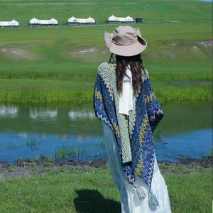 Ethnic knit shawl with wave pattern and tassels, bohemian style poncho for travel