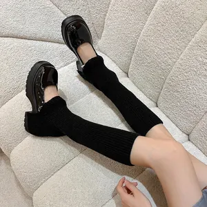 Y2K style black knit leg warmers with glossy platform Mary Jane shoes set