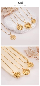 Detailed view of 18K gold-plated sun and heart pendants with beaded chain necklace