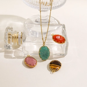 Oval amazonite pendants in 14K gold plated stainless steel on thin beaded necklaces