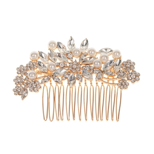 Elegant rose gold bridal hair comb with shimmering crystals and white pearls on white background