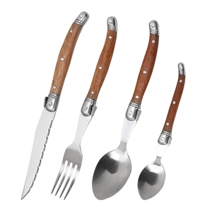 Sapele wood handle stainless steel cutlery set with iconic bee emblem on white background