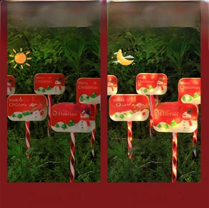 Solar Christmas candy cane garden lights with snowman prints and dual day night display