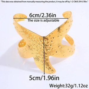 Detail showing 6cm width and 32g weight for this textured golden leaf cuff bracelet