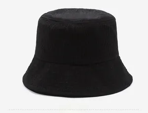 Detailed side profile of a black fisherman hat with textured vertical stripe fabric