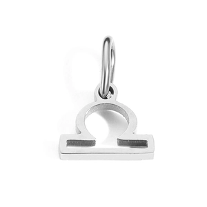 Macro shot of silver Libra zodiac pendant charm made of durable stainless steel